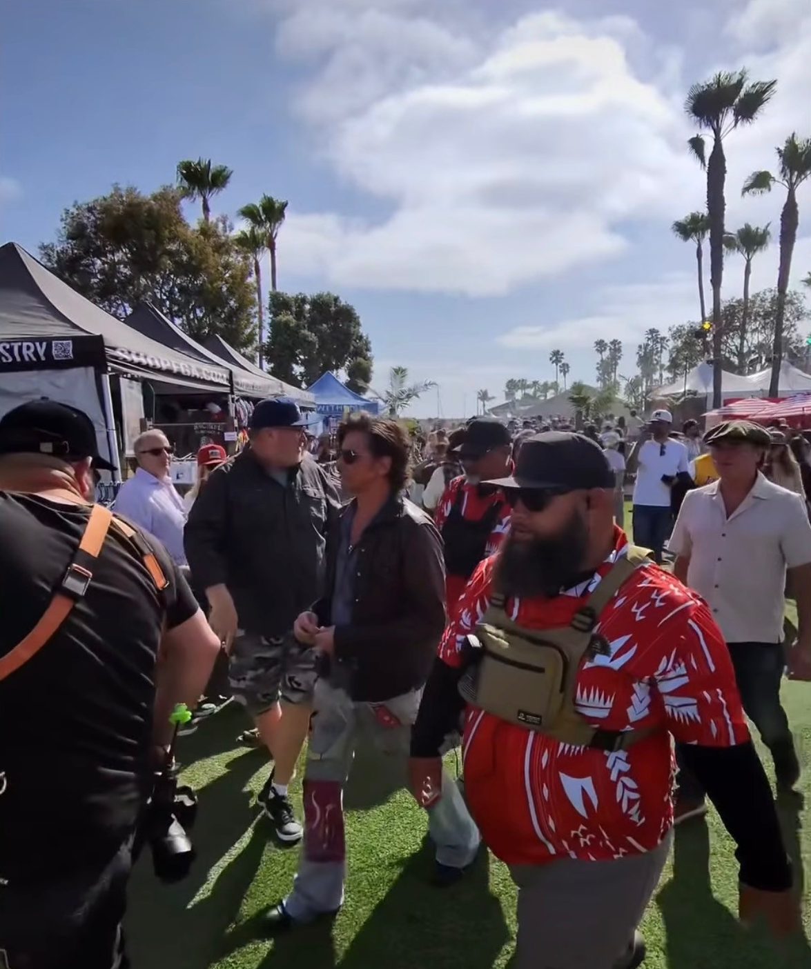 Aumaga team — Moving through festival grounds